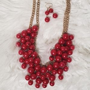 Beautiful red necklace with earrings to match.